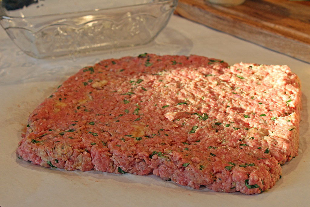 meat mixture flattened out on paper