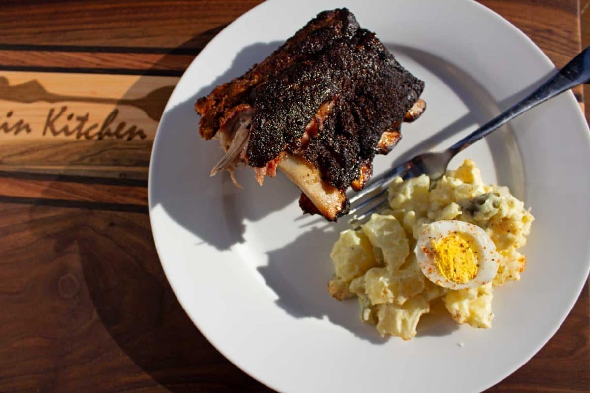 mama rosa's potato salad on plate with ribs