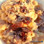 Loaded with big flavor, the smoked beef brisket skillet mac and cheese made with horseradish cheddar and decadently smothered bits of smoked beef brisket. | TheMountainKitchen.com