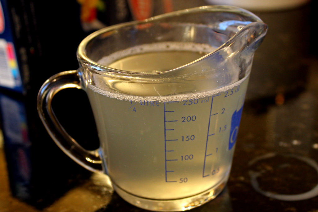 pasta water in glass measuring cup