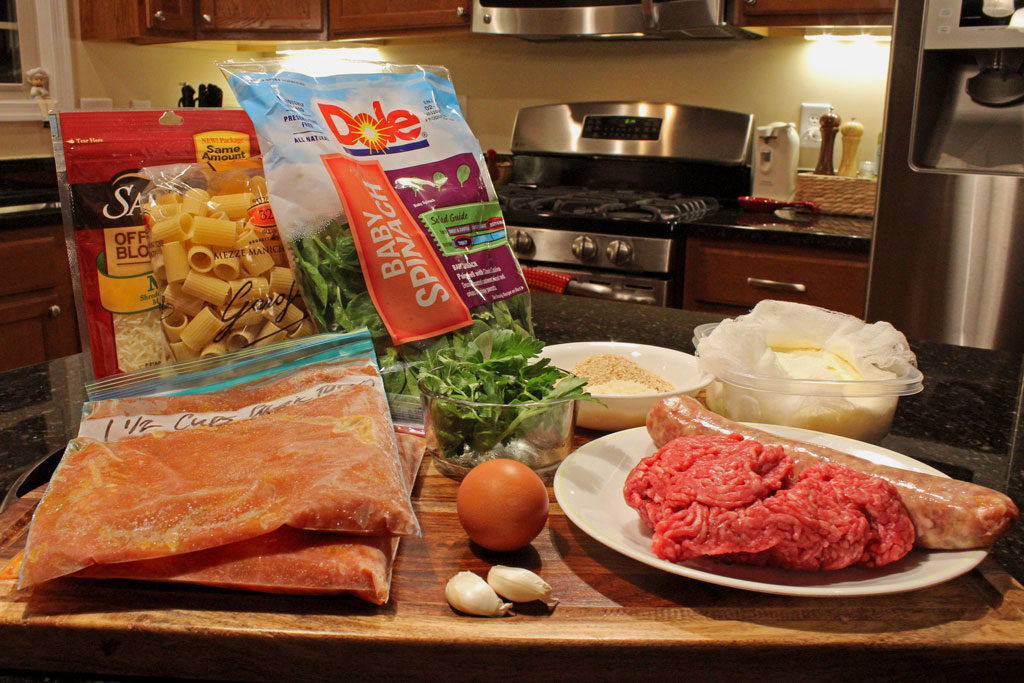 ingredients to make baked pasta with meatballs and spinach