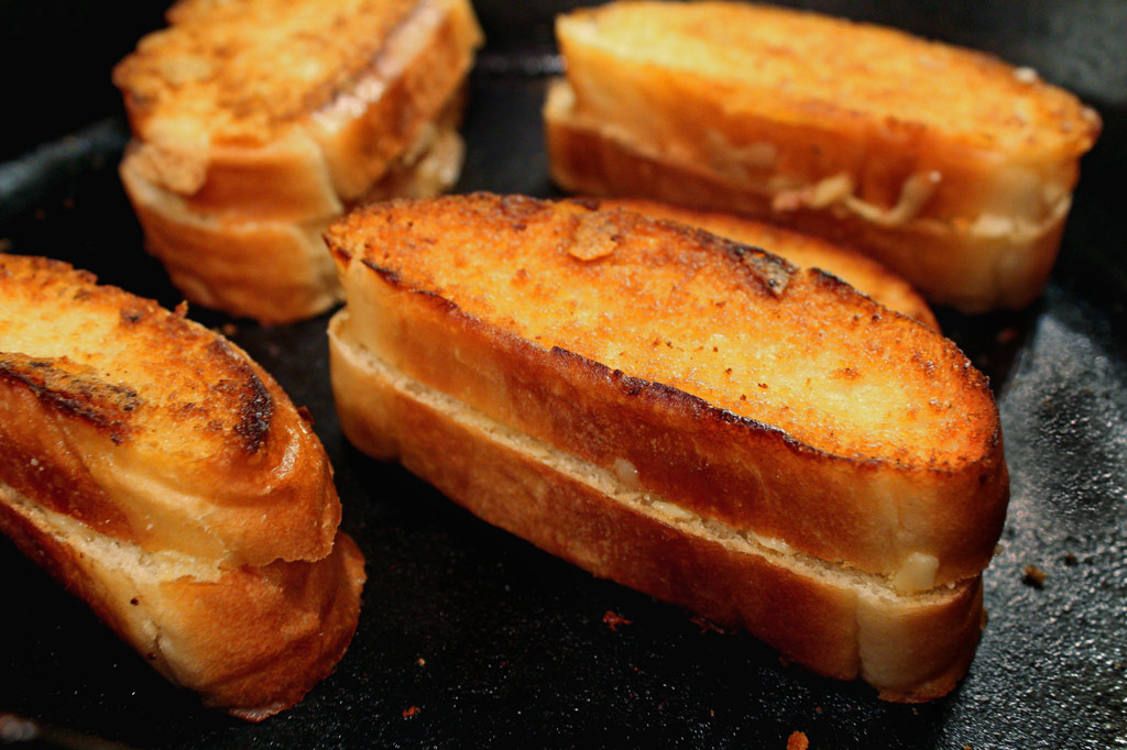 grilled cheese sandwiches in pan