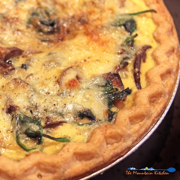 mushroom spinach quiche in pie pan