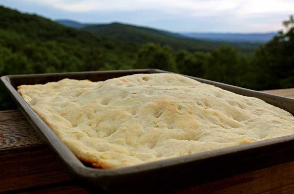 baked focaccia bread on sheet pan