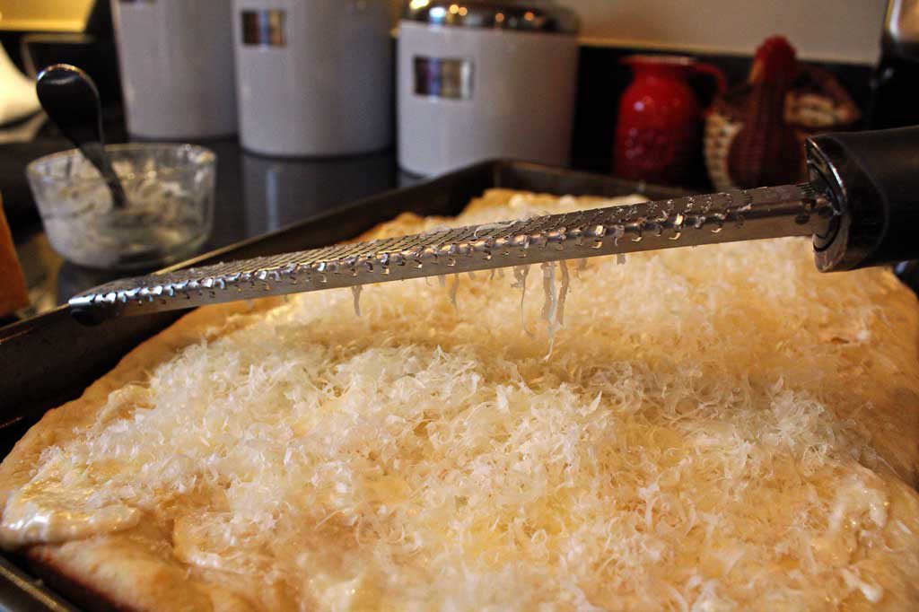 fresh grated parmesan on focaccia bread