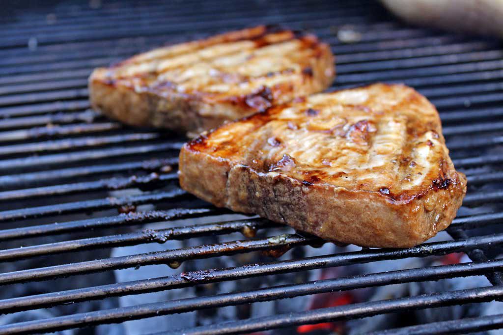 Swordfish is swimming steak! This simple yet elegant Asian-inspired grilled Indonesian swordfish has rich, bold flavor cooked right at home on your grill. | TheMountainKitchen.com