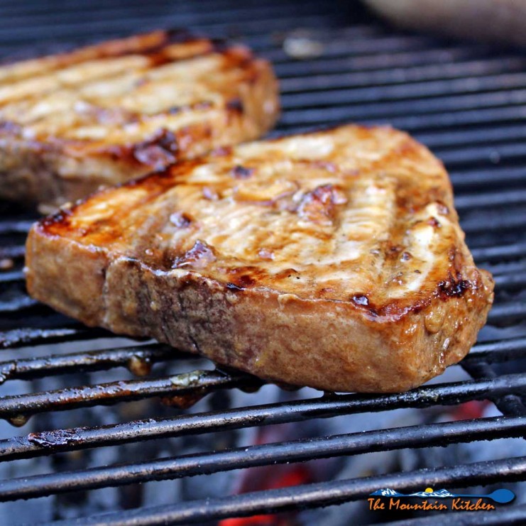 Swordfish is swimming steak! This simple yet elegant Asian-inspired grilled Indonesian swordfish has rich, bold flavor cooked right at home on your grill. | TheMountainKitchen.com