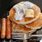 Brighten your day with lemon zest buttermilk pancakes. Buttery and fluffy, with a slight hint of lemony flavor. My favorite pancake recipe of all time! | TheMountainKitchen.com
