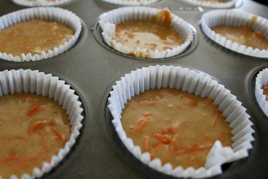 lined muffin tin with batter