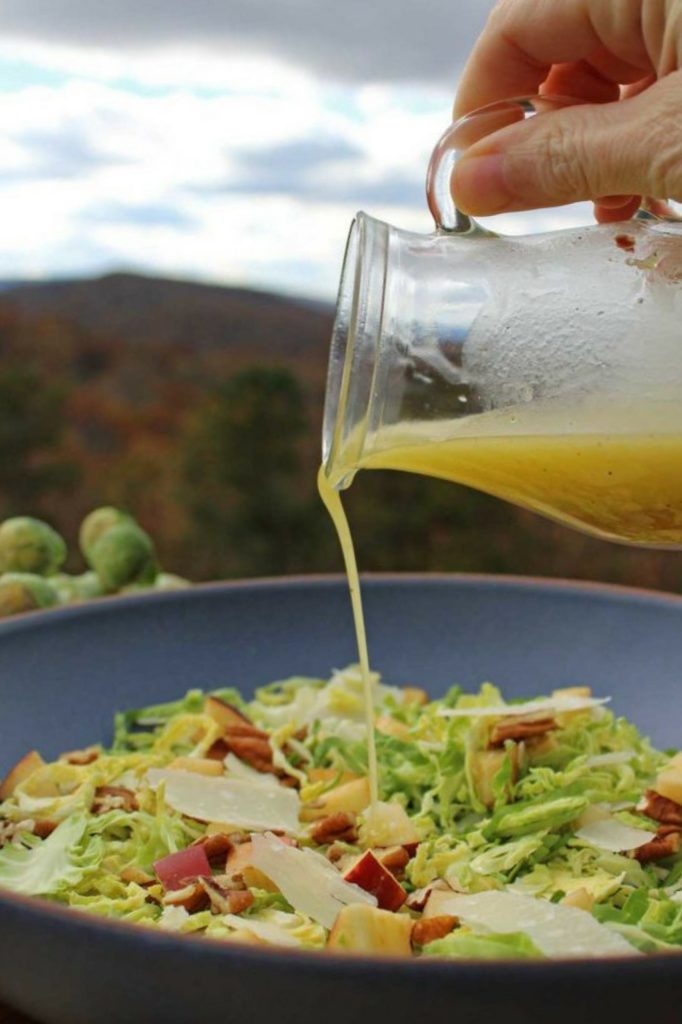 pouring dressing with mountain view