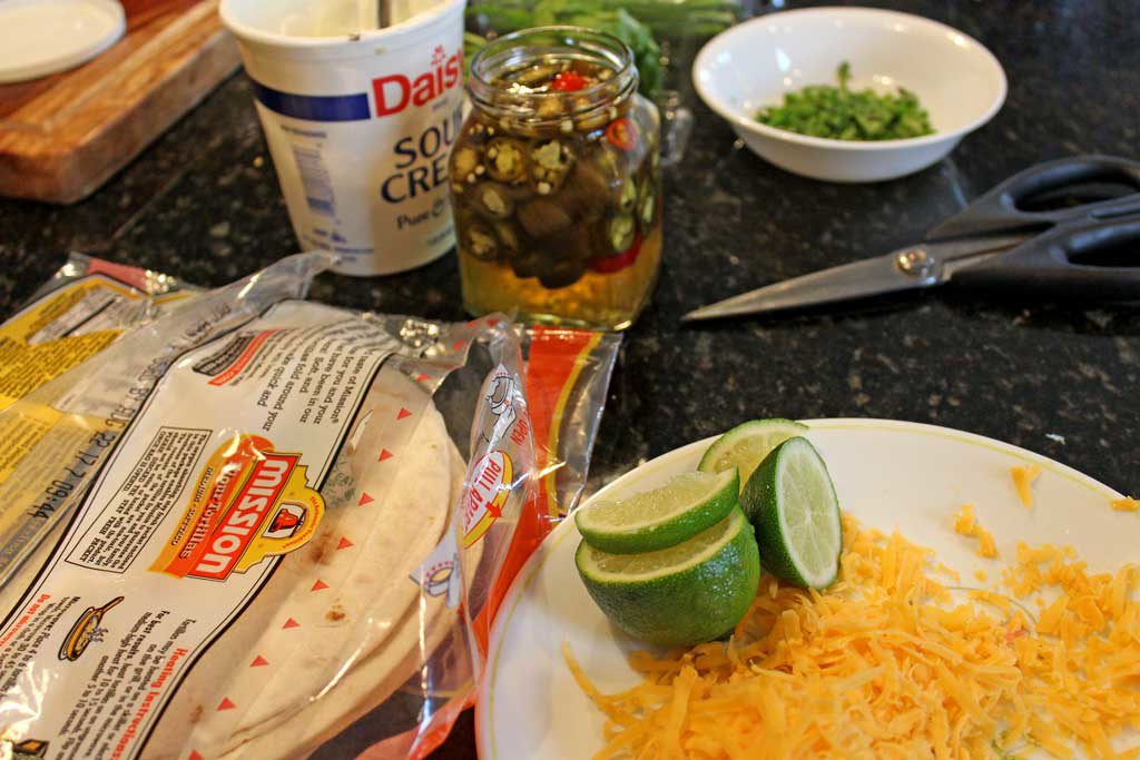 These refried bean and cheese quesadillas, filled with refried beans, roasted poblano peppers and cheese and can be made with unlimited vegetarian toppings. | TheMountainKitchen.com