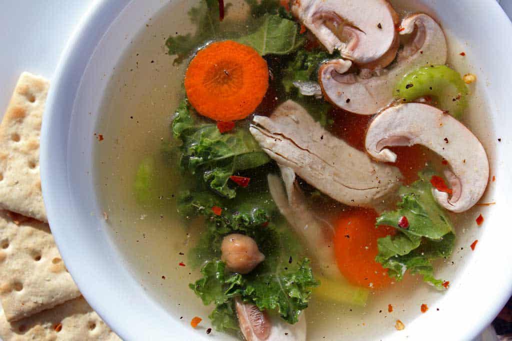 Immunity soup in bowl with crackers on the side