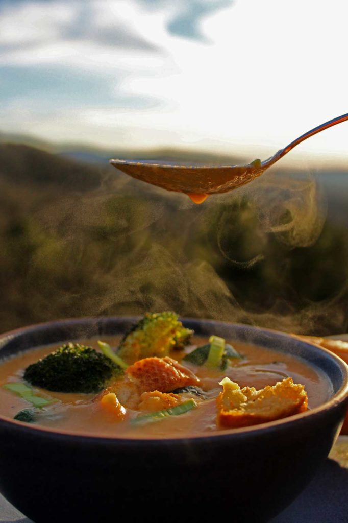 steam bowl of soup with mountain view