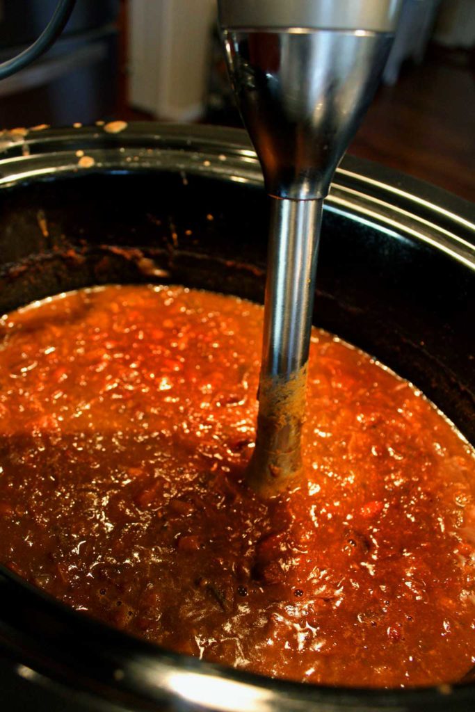 blending soup with immersion blender