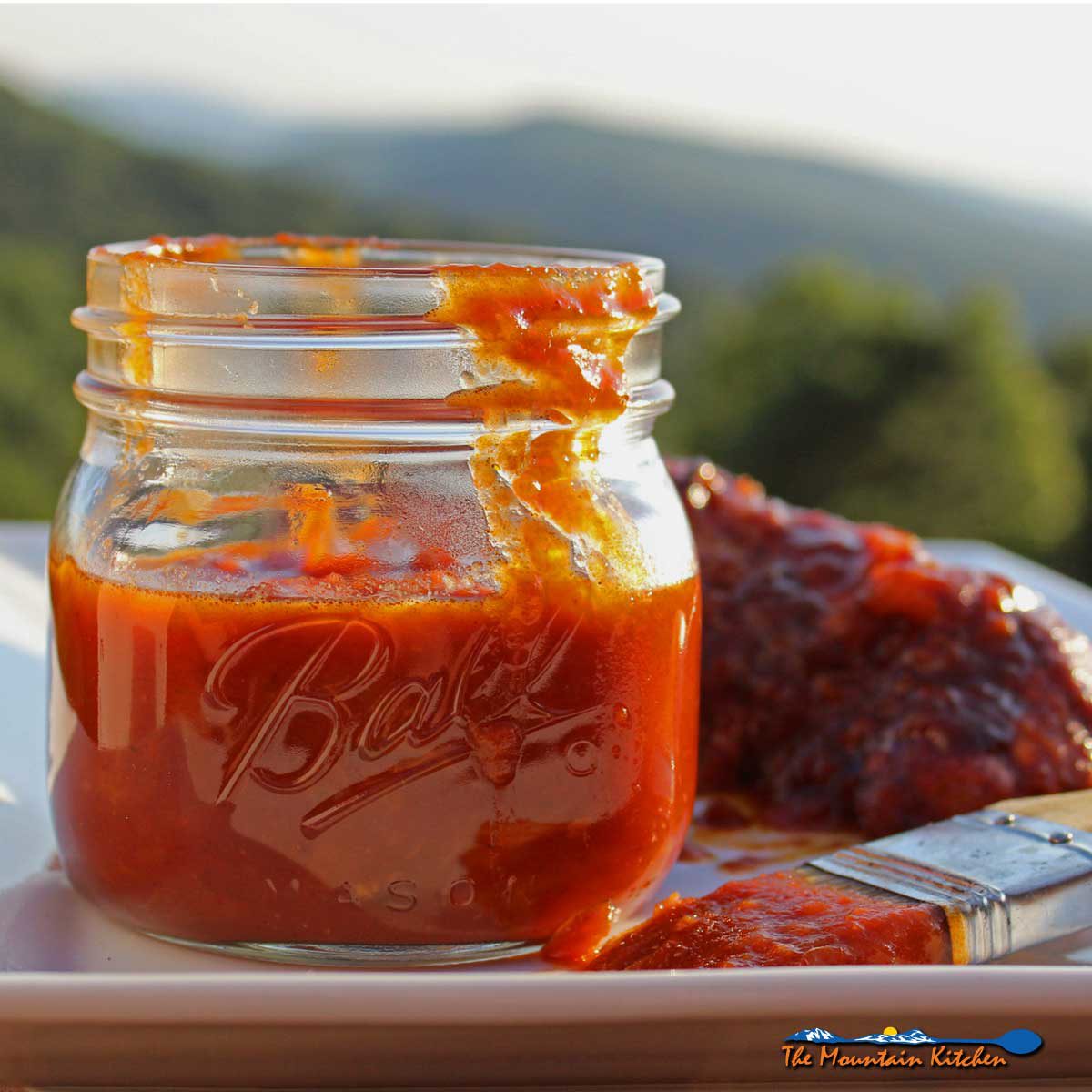 jar of spicy chipotle peach barbecue sauce