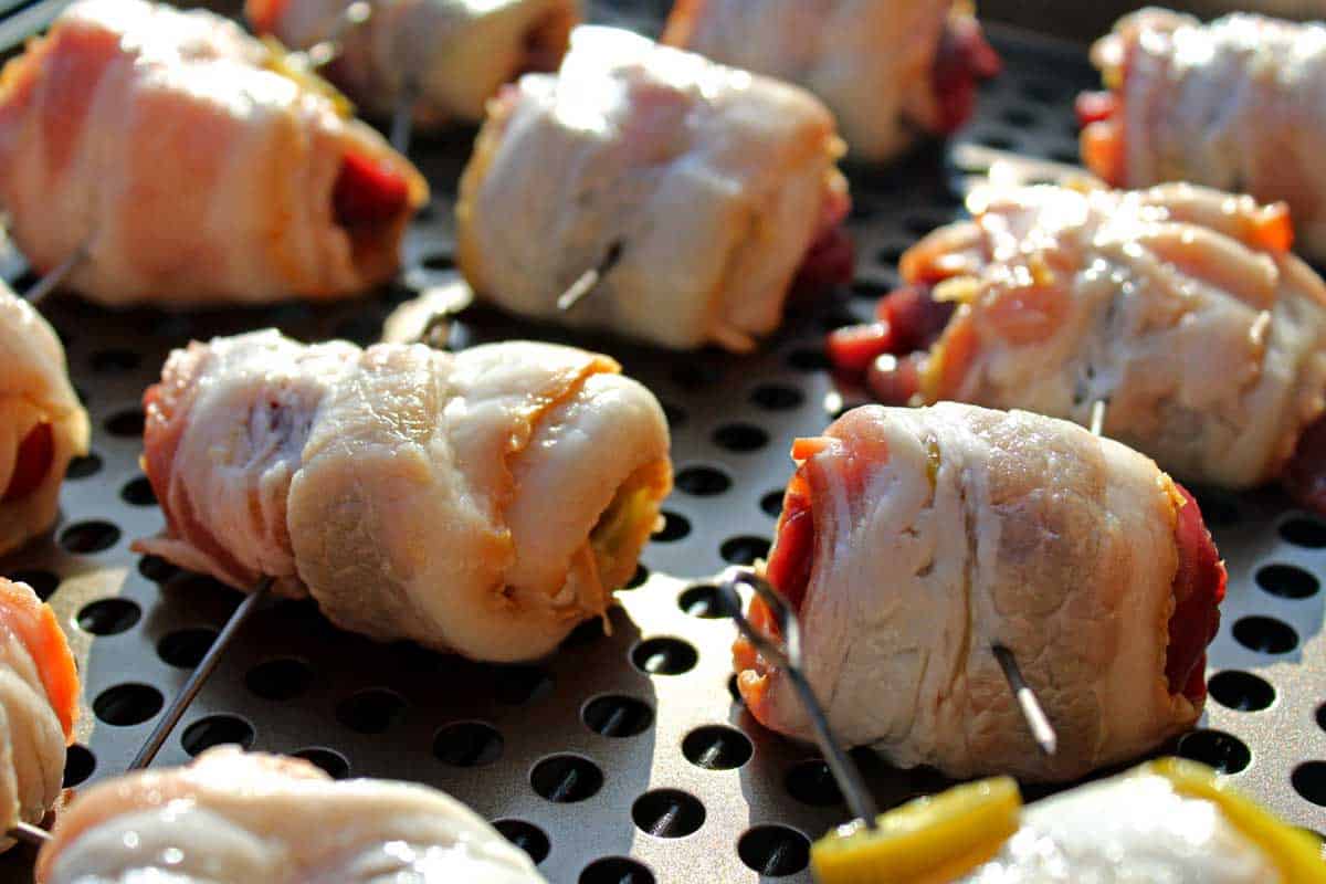 Bacon wrapped dove poppers are great way to celebrate the hunt. A great balance of grilled fatty bacon, tangy chilies, savory-sweet garlic and smoky meat.