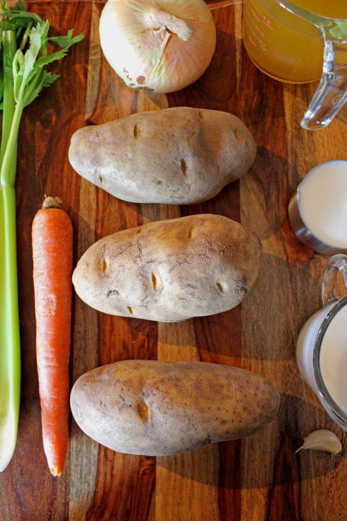 This homemade Potato Cheddar Soup is a hearty rich and creamy soup with richly seasoned flavors that will keep you coming back for more. A vegetarian treat!