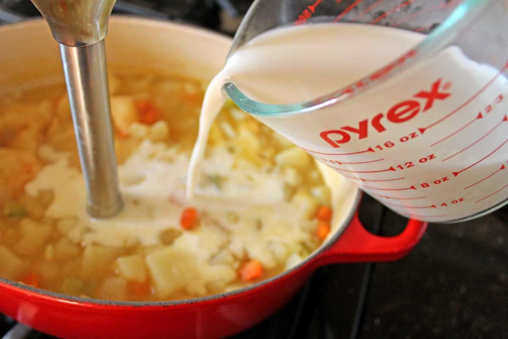 This homemade Potato Cheddar Soup is a hearty rich and creamy soup with richly seasoned flavors that will keep you coming back for more. A vegetarian treat!