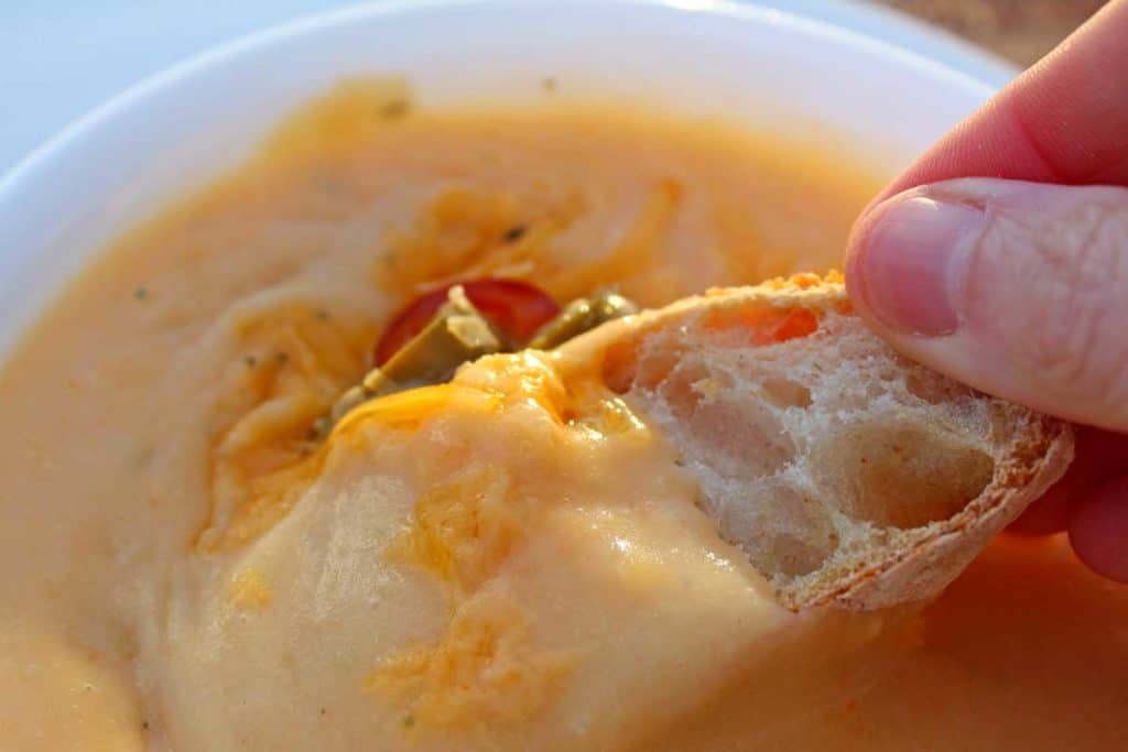 This homemade Potato Cheddar Soup is a hearty rich and creamy soup with richly seasoned flavors that will keep you coming back for more. A vegetarian treat!