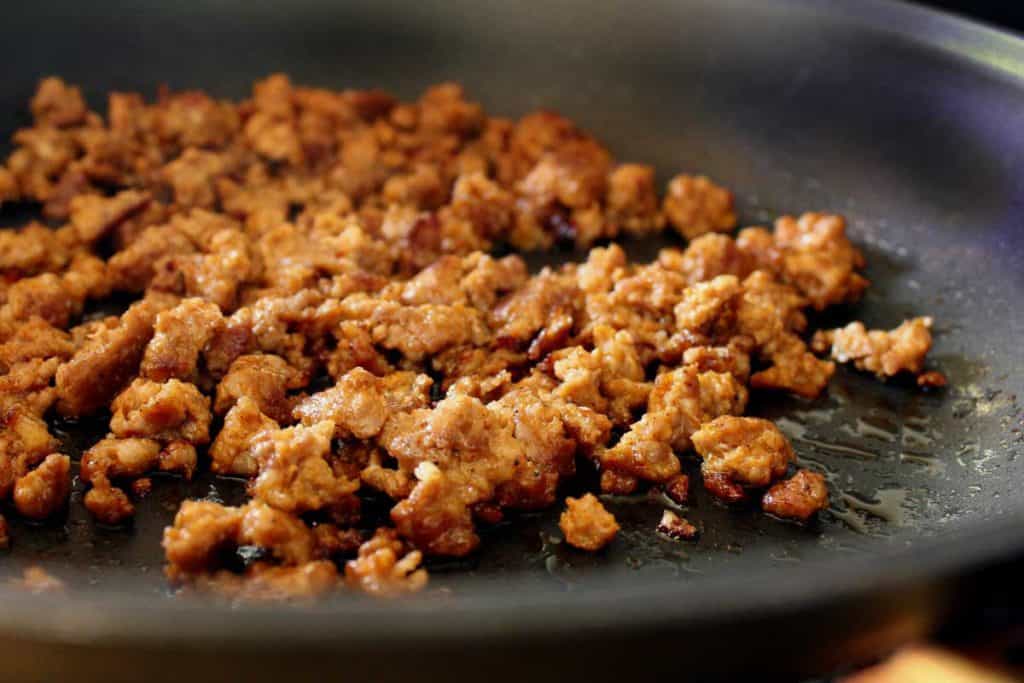 chorizo sausage crumbled in a pan