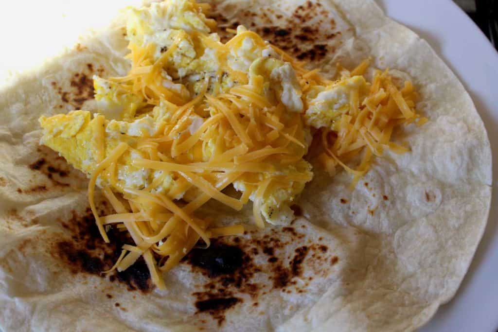 David's breakfast burritos are loaded in tortilla filled with chorizo sausage, eggs, cheddar cheese, poblano peppers, and potatoes. Served with spicy salsa!