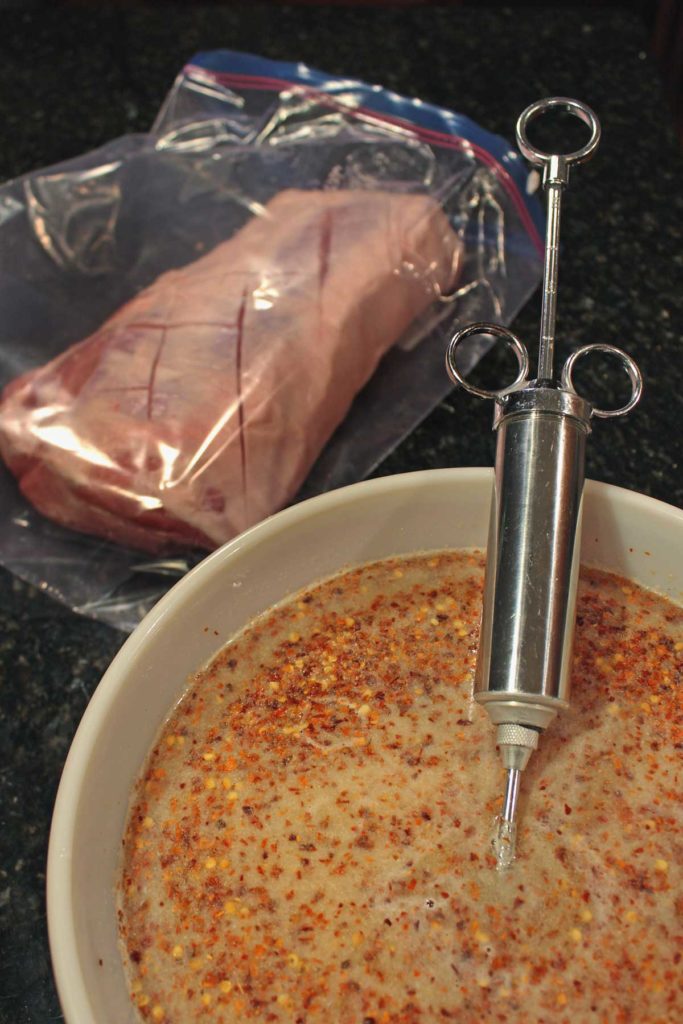 brine solution and meat in a zip-top bag