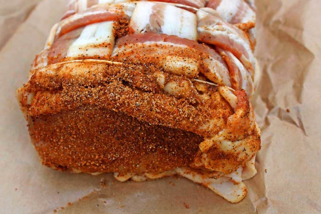 bacon wrapped pork loin ready for the grill