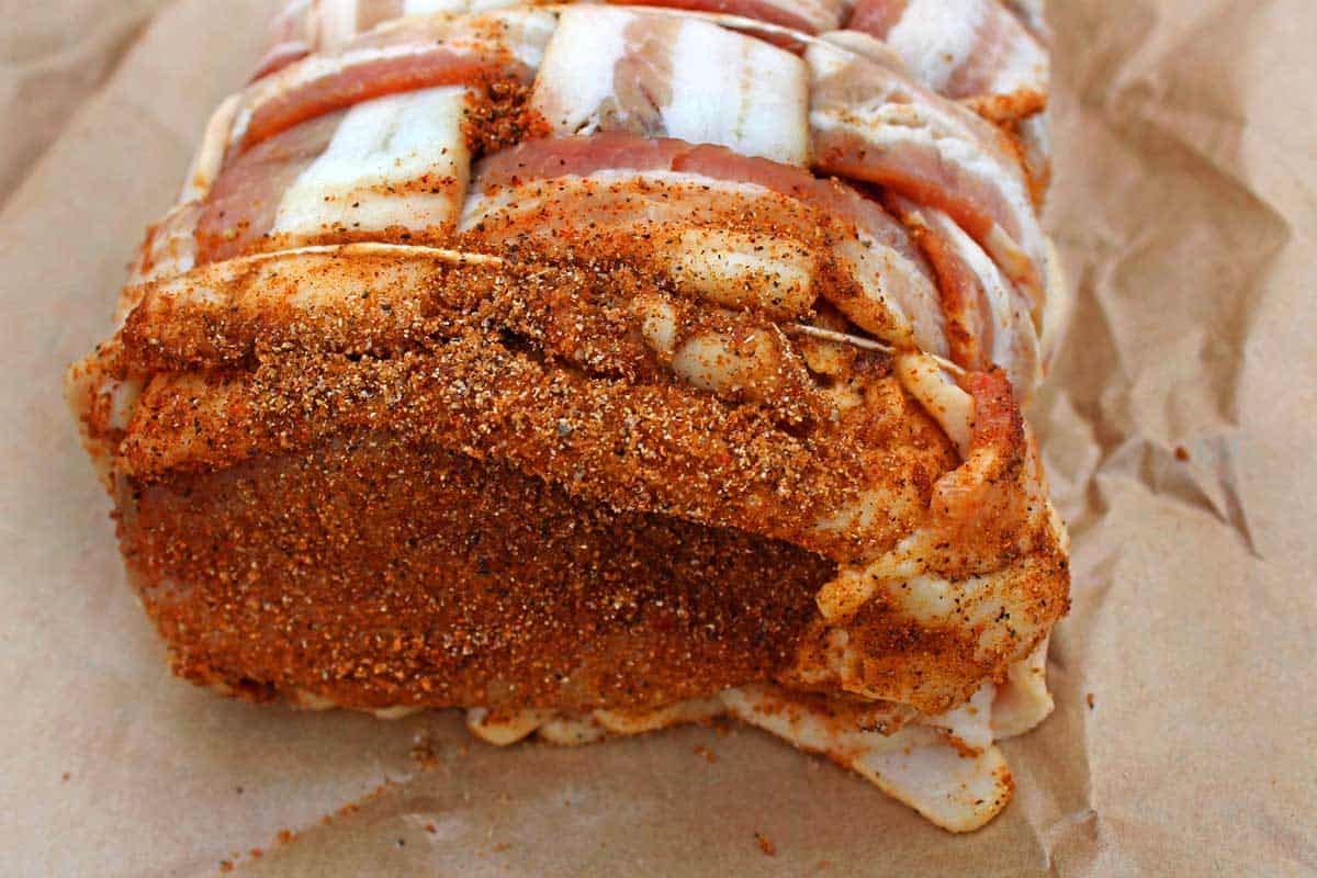 bacon wrapped pork loin ready for the grill