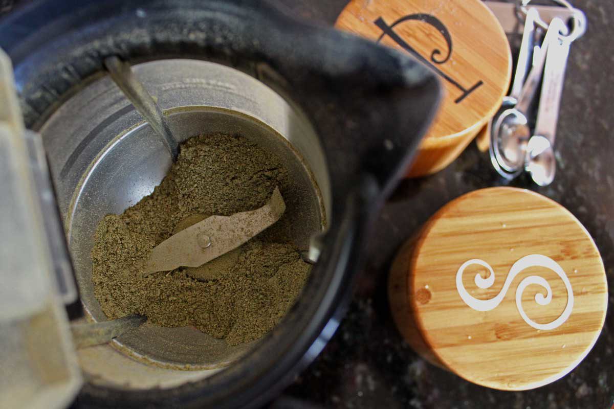 spice grinder with powdered spice inside