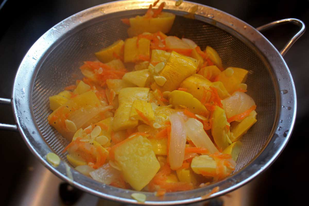 vegetables straining in a sieve
