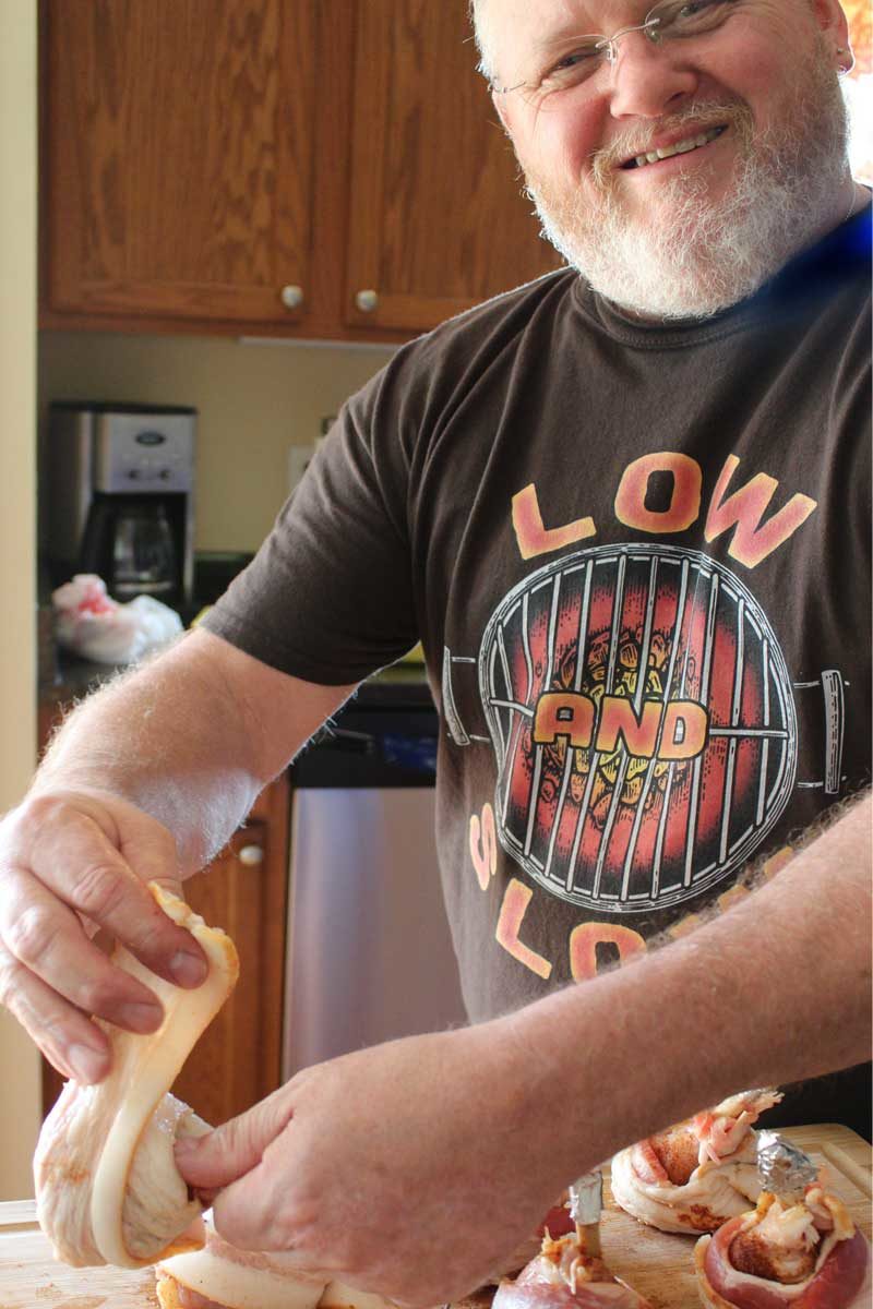 David prepping bbq chicken lollipops