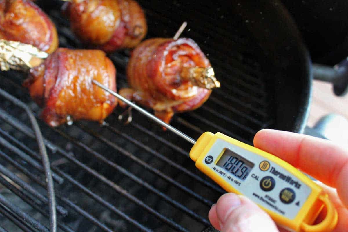 checking meat with Thermoworks thermometer
