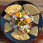 Greek nachos on a plate