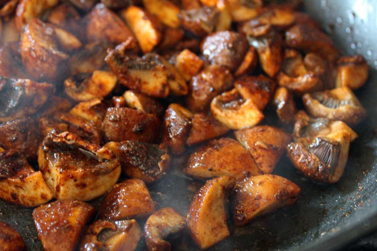 seasoned mushrooms in pan