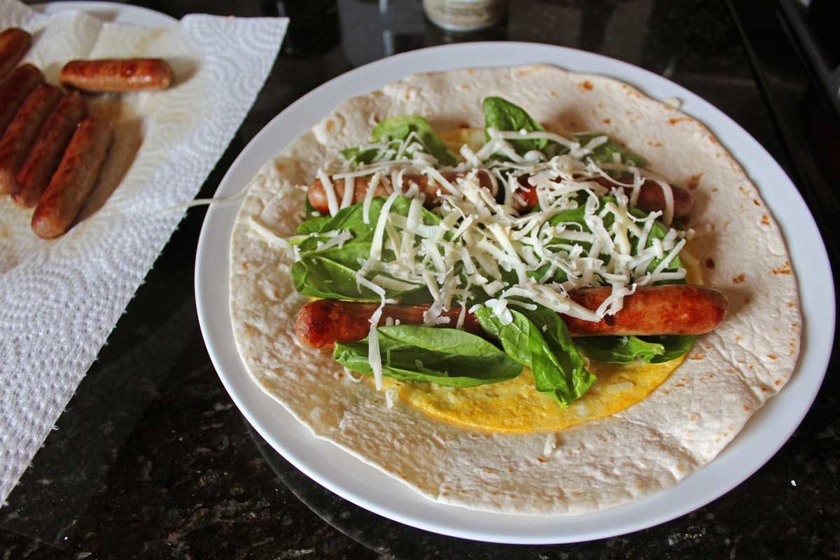 tortilla with filling laid out flat