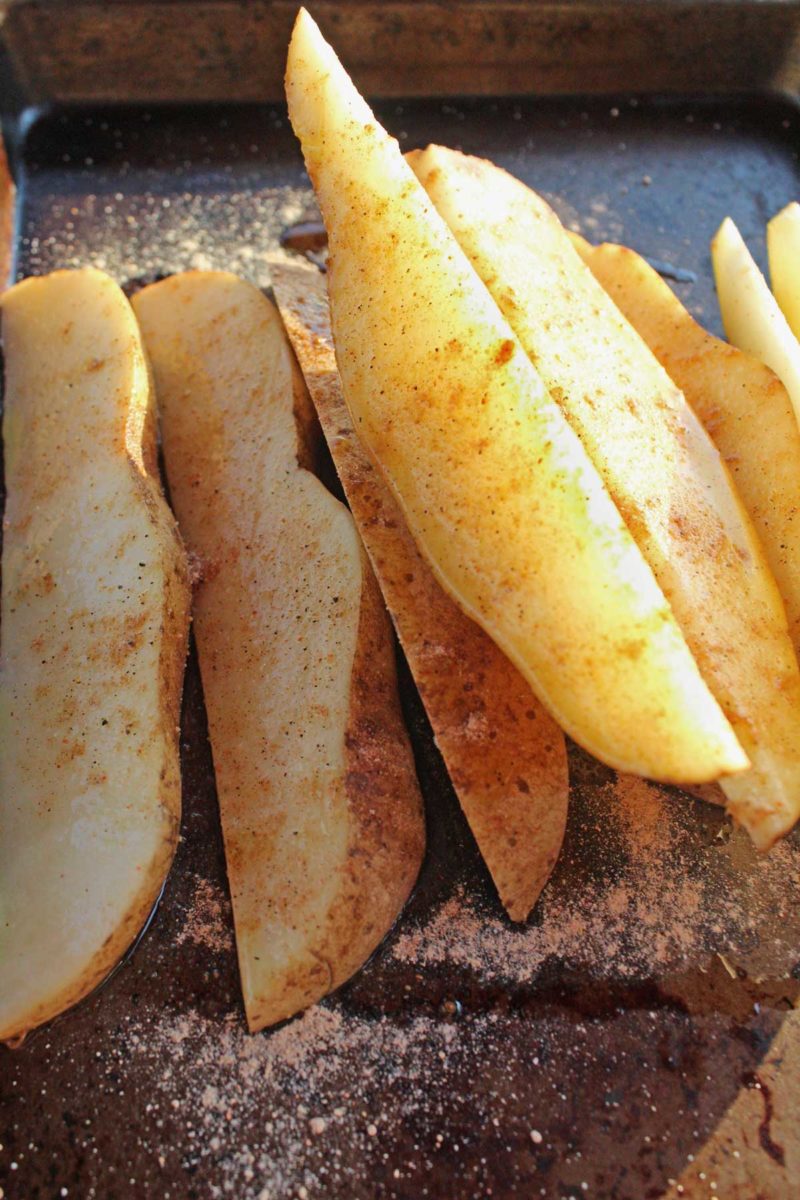 seasoned potatoes on sheet pan