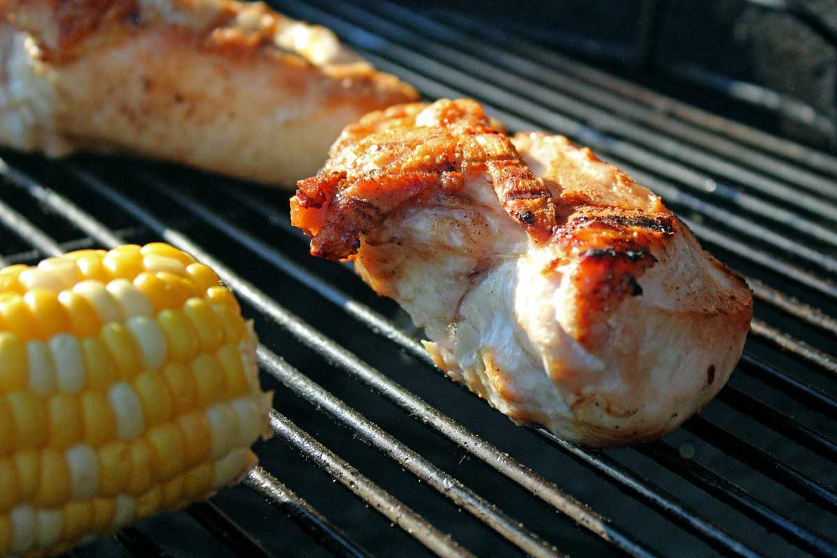 chicken and corn on grill