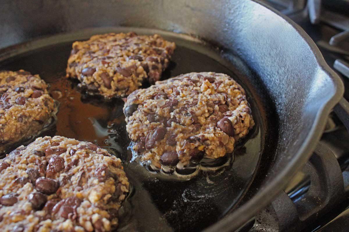 black bean burgers in pan