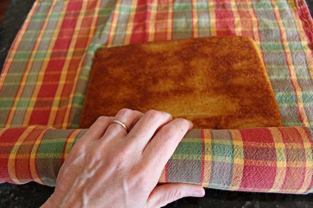 rolling cake into towel