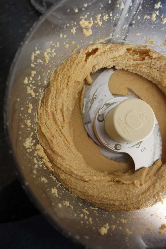the peanut butter after the clump splatters before scraping down the sides of the bowl