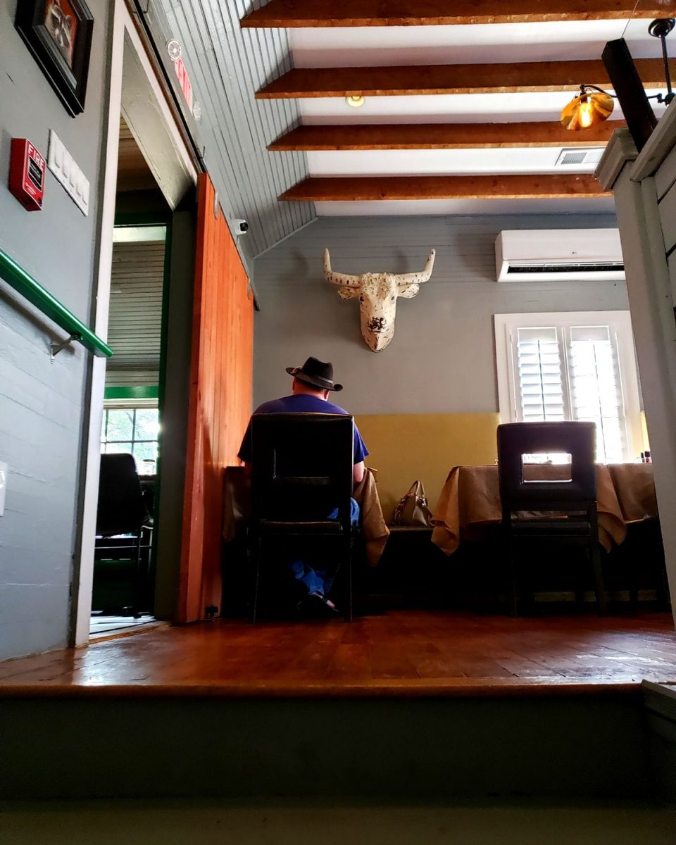 David seated at table at The Front Porch