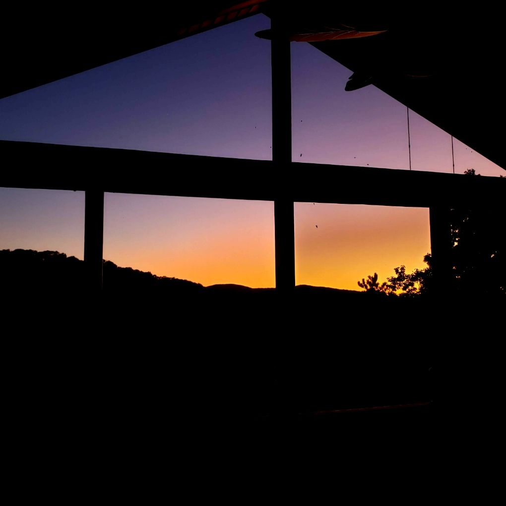 mountain sunset through our screen porch