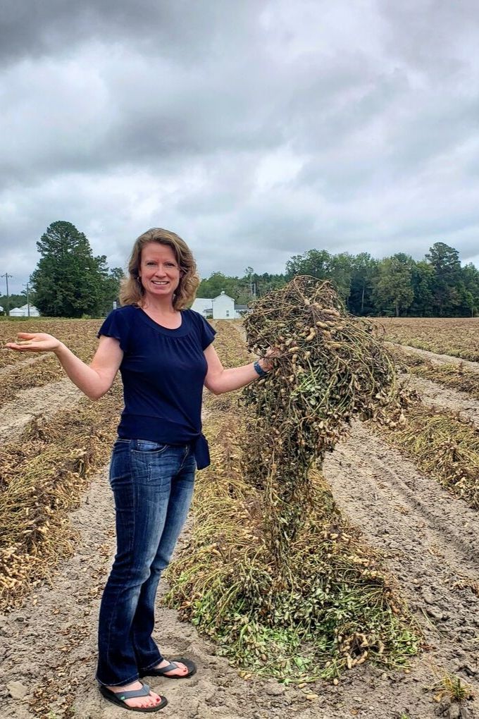 Debbie standing in the peanut field