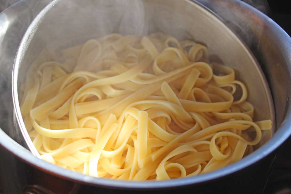 draining fettuccine