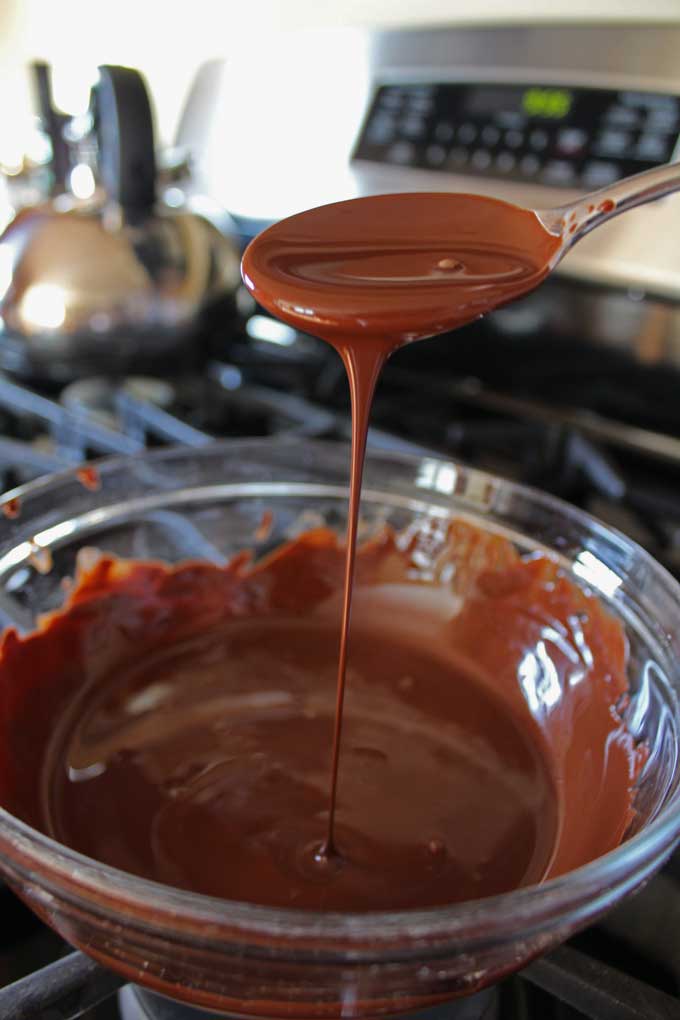 spoon full of drizzling dark chocolate
