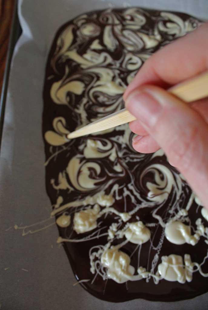 swirling the white chocolate into dark chocolate