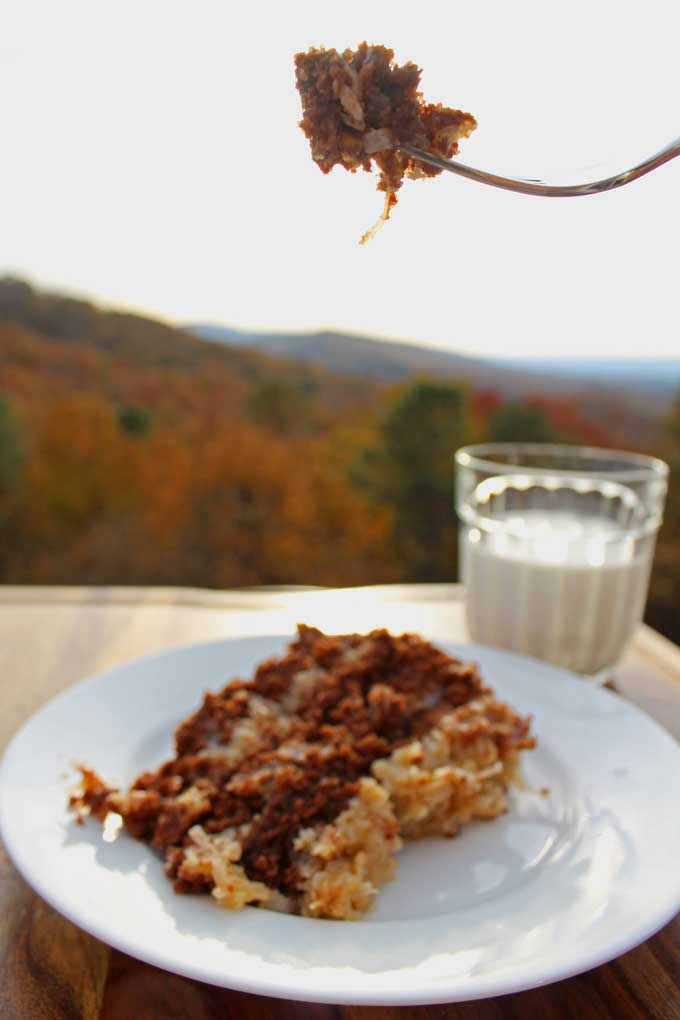 German chocolate cake a glass of milk and mountain view