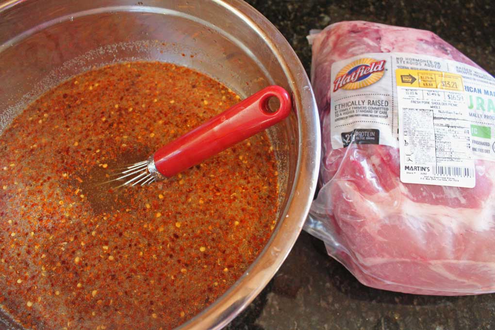 brine solution in bowl for pork shoulder