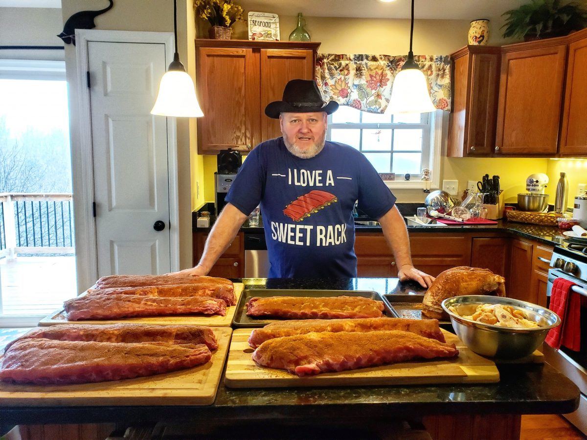 david with ribs on cutting boards