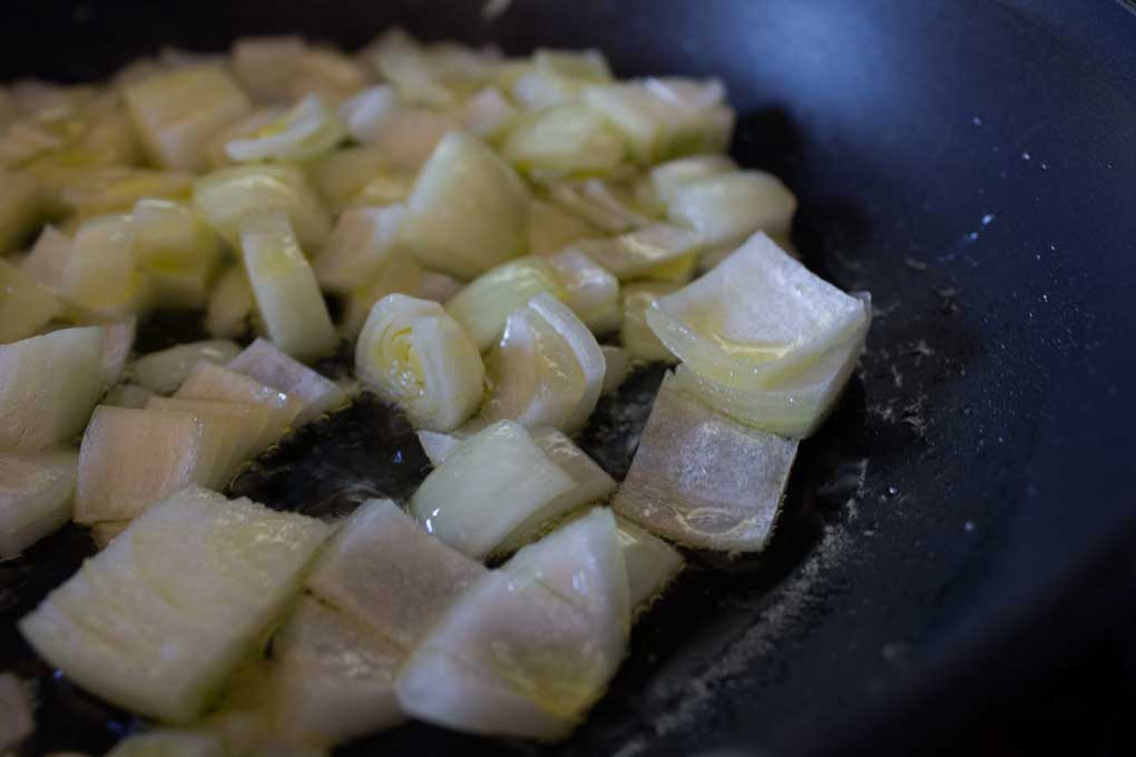 onions cooking in pan